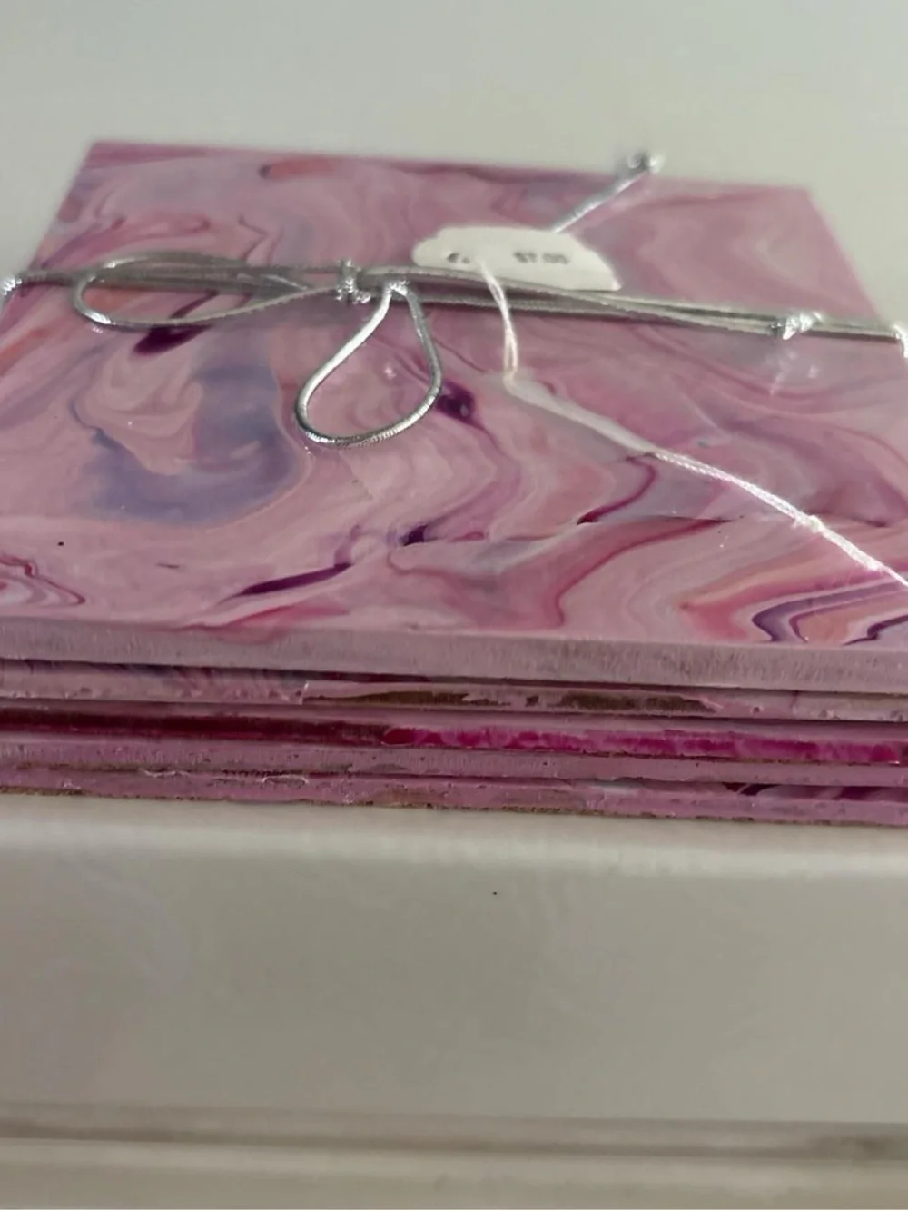5 Resin Pink Marble Effect Coasters tied with Silver Ribbon